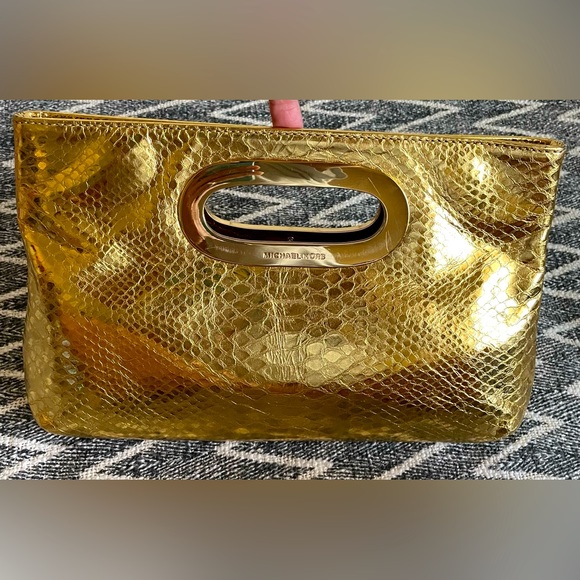 Michael Kors Handbags - Michael Kors Snake print Clutch Gold